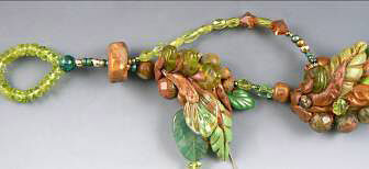 Clay and glass beads on beading wire